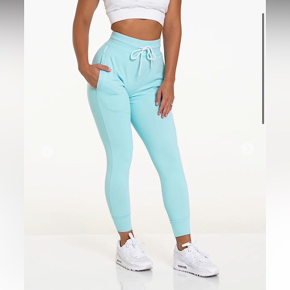 NVGTN sea foam green joggers